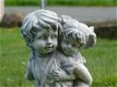 tuinbeeld , jongen en meisje - 0 - Thumbnail