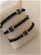 Zwarte glanzende kralen armband met letter bedel coco ibiza - 0 - Thumbnail