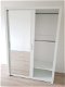 VOORRAAD Mat witte zweefdeur kledingkast met spiegels Vasto 150 cm MONTAGE MOGELIJK - 1 - Thumbnail