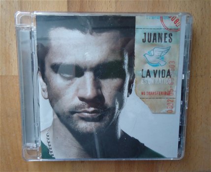 Te koop de originele CD La Vida...Es Un Ratico van Juanes. - 0