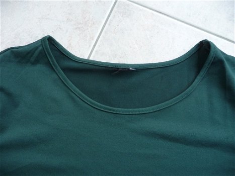 Groen T-shirt maat 54. - 2