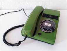 Vintage groene telefoon met draaischijf