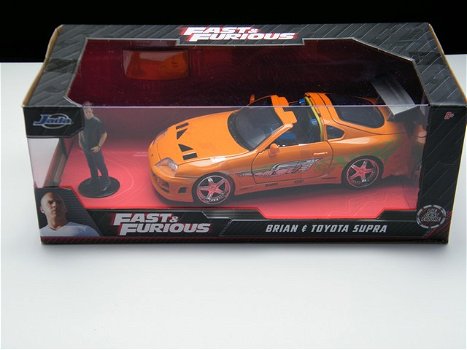 Toyota Supra MK IV Fast and Furious modelauto + figuur Brian 1:24 - 0