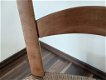 vintage lage houten stoel met rieten zitting - 4 - Thumbnail