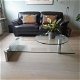 glazen design salontafel met draaibaar plateau i.z.g.s - 0 - Thumbnail