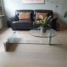 glazen design salontafel met draaibaar plateau i.z.g.s