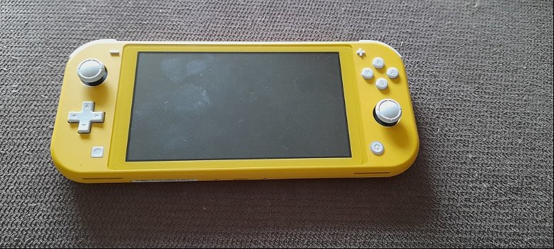 Zgan Nintendo switch lite week oud 2 games - 0