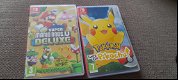 Zgan Nintendo switch lite week oud 2 games - 1 - Thumbnail