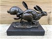 Bronzen beeld , rennende hazen , haas , konijn , beeld - 0 - Thumbnail