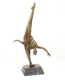 bronzen beeld , vrouwelijke turnster, turne