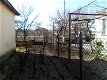 Woonhuis met garage tuin balkon en terras - 1 - Thumbnail