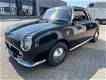 Unieke LINKSgestuurde Nissan Figaro met zeer snelle motor en handgeschakeld! - 1 - Thumbnail