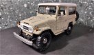 Toyota FJ40 beige 1/24 Motormax - 1 - Thumbnail