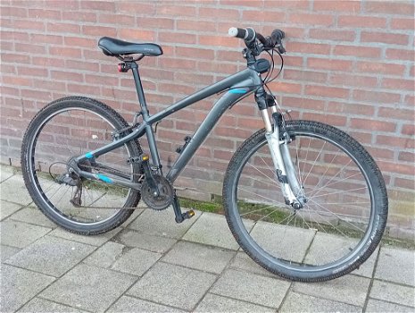 Rockrider SL100 met versnellingen 27.5 ïnch wielen laag frame!!! ik heb er twee staan - 1