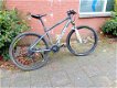 B-twin Rockrider Mountainbike 21versn. 27.5ïnch wielen en schijfremmen te koop i.v.m.aankoop E-Bike - 2 - Thumbnail