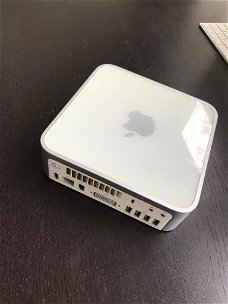 Mac Mini YM7501JVYL2 met 2 Ghz en de Stroomadapter en Apple Mighty Usb Mouse Enz.