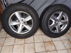 Te koop bijna nieuwe Chevrolet Captiva lichtmetalen Opel Antara winterbanden set voor 425,- euro