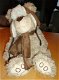 Te koop pluche knuffelhond met sjaal en muts (hoogte: 25 cm) - 0 - Thumbnail