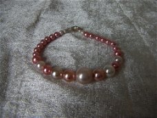 armband van roze glaskralen 21,5 cm lang