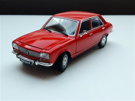 Nieuw miniatuur modelauto Peugeot 504 – Welly 1:24 - 1