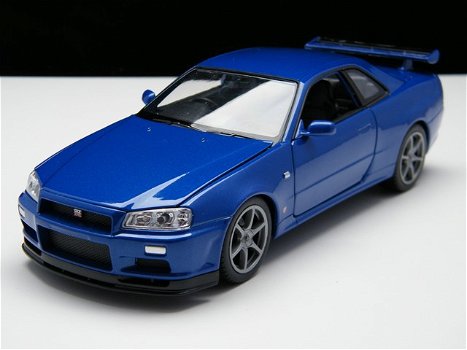 Nieuw miniatuur modelauto Nissan Skyline GT-R R34 – Welly 1:24 - 0