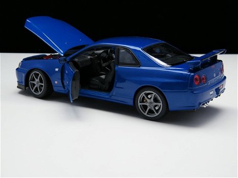 Nieuw miniatuur modelauto Nissan Skyline GT-R R34 – Welly 1:24 - 3