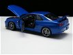 Nieuw miniatuur modelauto Nissan Skyline GT-R R34 – Welly 1:24 - 3 - Thumbnail