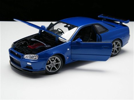 Nieuw miniatuur modelauto Nissan Skyline GT-R R34 – Welly 1:24 - 4