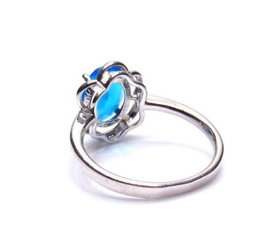 Mooie ring met helderblauwe steen - 1