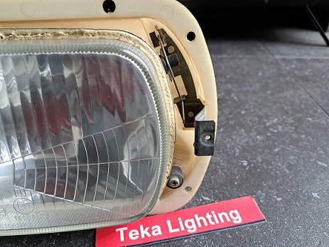 Saab 99 Koplamp Hella 003-112097 met koplamppot - 2