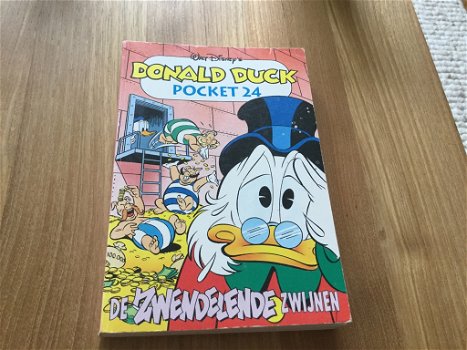 Donald Duck, De zwendelende zwijnen - 0