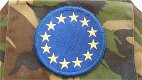 Armband / Schouderband / Armlet, EUFOR, KL, Woodland Uitvoering, vanaf 2004.(Nr.1) - 1 - Thumbnail