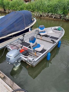 Een mooie aluminium visboot 20PK Honda motor begrenst geen vaarbewijs nodig met ligplaats - 0