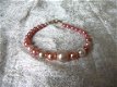 armband van roze glaskralen 21,5 cm lang - 0 - Thumbnail