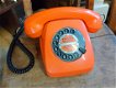 Retro oranje telefoon met draaischijf - 0 - Thumbnail