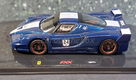 Ferrari FXX 2006 blauw / wit 1:43 Hotwheels Elite H402 - 1 - Thumbnail