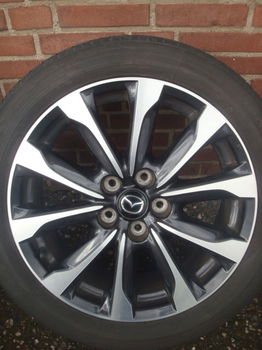 18 Originele Mazda Velgen + Banden Steek 5x114,3 - 0