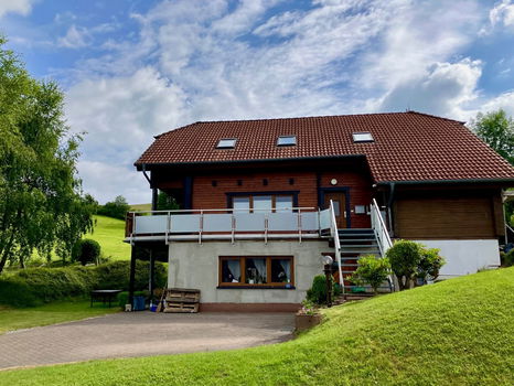 D834 Vrijstaand Scandinavisch houten huis met 3 woonlagen in Helmighausen - 0