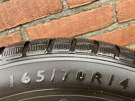 Winterbanden op velg. Dunlop 165/70R14 - 1