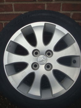 15”inch Daihatsu lichtmetalen velgen met Banden 4x100 - 0