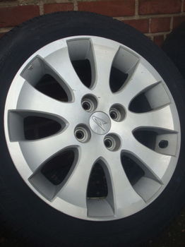 15”inch Daihatsu lichtmetalen velgen met Banden 4x100 - 1