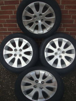 15”inch Daihatsu lichtmetalen velgen met Banden 4x100 - 5