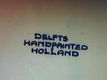 Delfts handpainted Holland Wandbord. Met molen patroon Doorsnee is 25,5 cm en puntgaaf. - 2 - Thumbnail