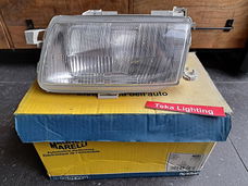 Opel Astra F Koplamp Magneti Marelli LPB262 712351301120 Links