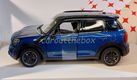 Mini Cooper S Countryman blauw 1:24 Rastar - 0 - Thumbnail