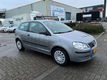 Volkswagen Polo 1.2 FUN 47KW 2006 Grijs,PDC,STOELVER WARMING - 1 - Thumbnail