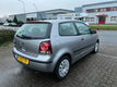 Volkswagen Polo 1.2 FUN 47KW 2006 Grijs,PDC,STOELVER WARMING - 2 - Thumbnail