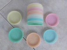 Tupperware vintage onderzetters pastel kleurtjes.