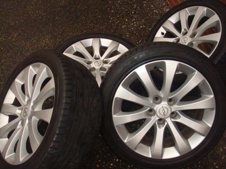 17 Inch Originele Cosmo velgen en banden steek 5x110 - 3
