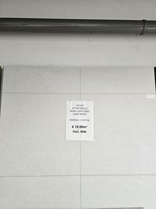 Grote keramische tegels voor €19,99 p/m². Elke zondag open in Breda en Lier.